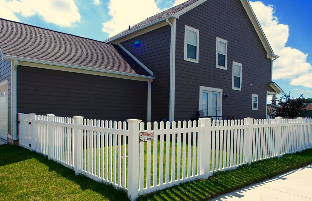 white vinyl dog ear picket fence installation around Indianapolis