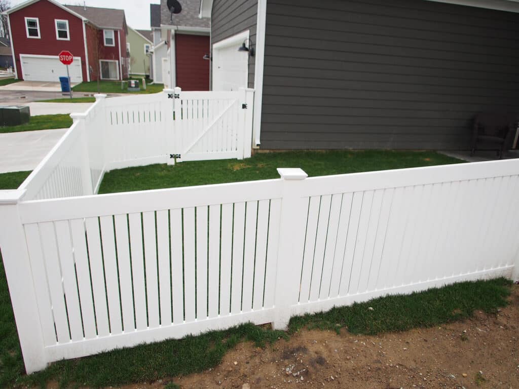 White vinyl semi-private fence installation around Indianapolis