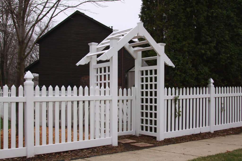 white fence installation with custom gate around Indianapolis