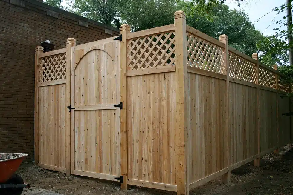 Custom cedar privacy fence with lattice top around Indianapolis