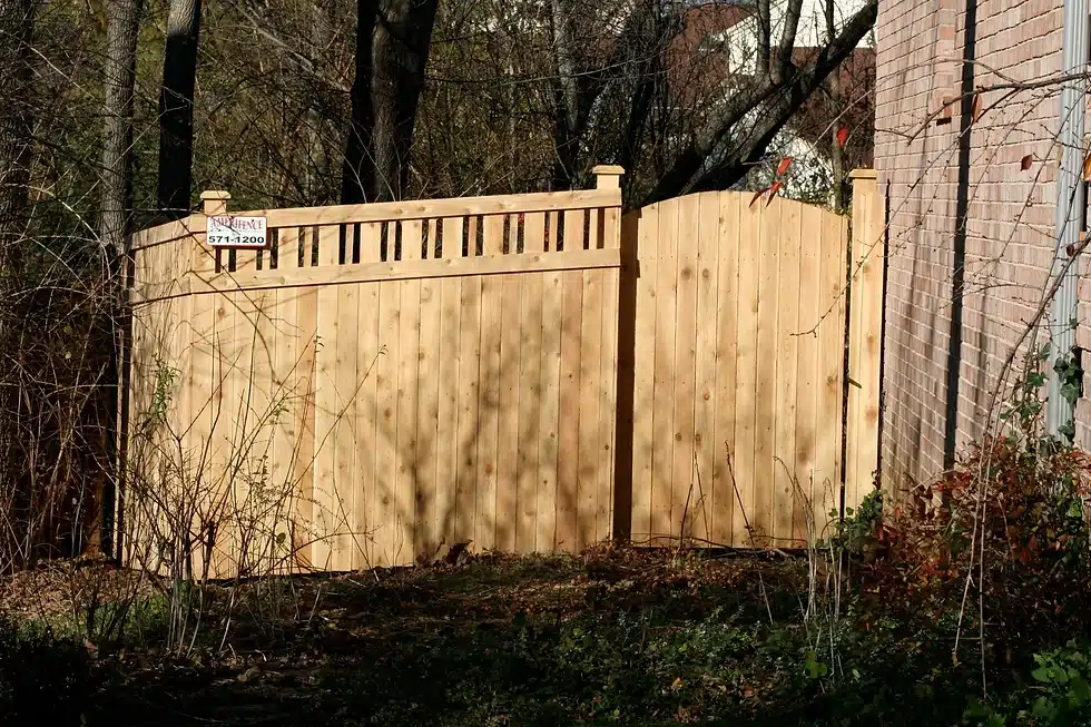 Custom wood lattice-topped fence installation around Indianapolis