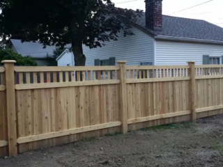 Lattice-topped cedar privacy fence installation in Indianapolis