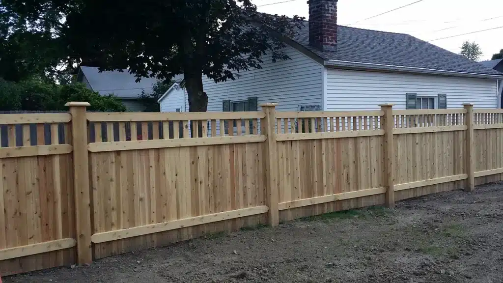 Lattice-topped cedar privacy fence installation in Indianapolis