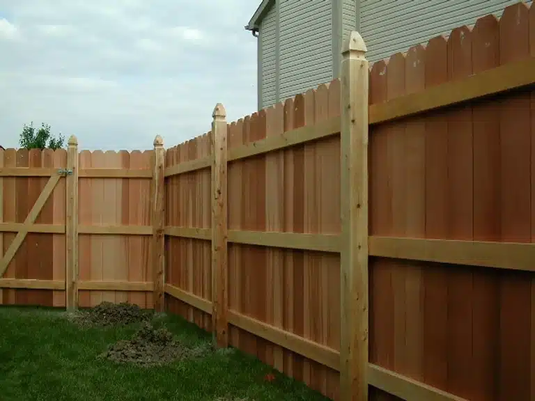 Wood privacy fence installation around Indianapolis