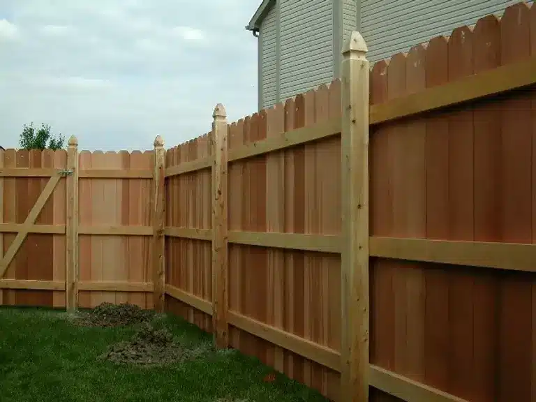 wooden dog-eared privacy fence installation around Indianapolis