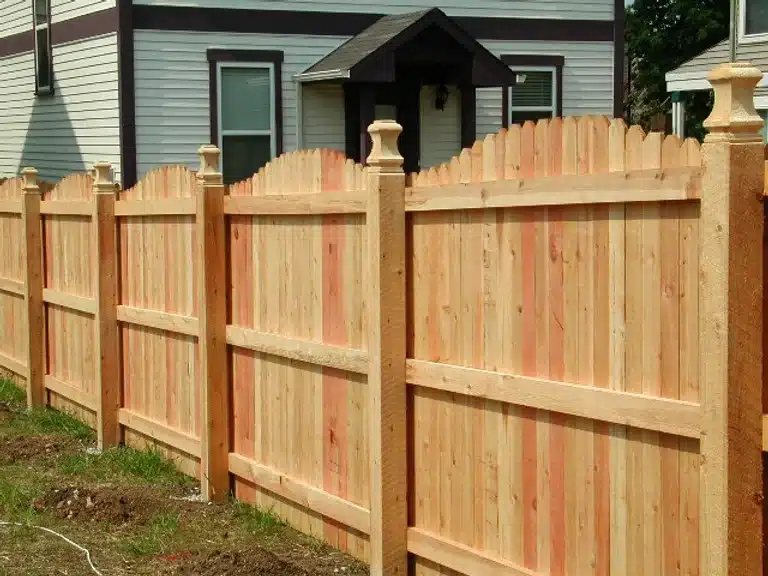 Bow-top wooden dog-eared privacy fence builders near Indianapolis