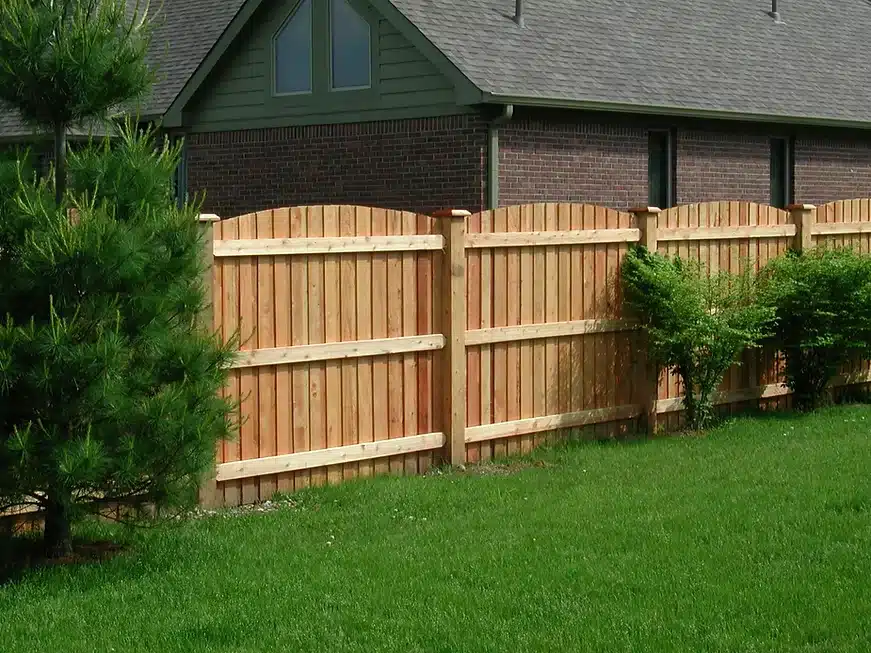 Wooden bow top privacy fence around Indianapolis