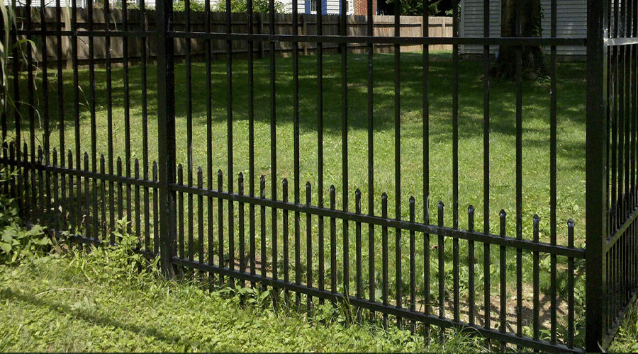 Aluminum puppy picket fence installation in Indianapolis