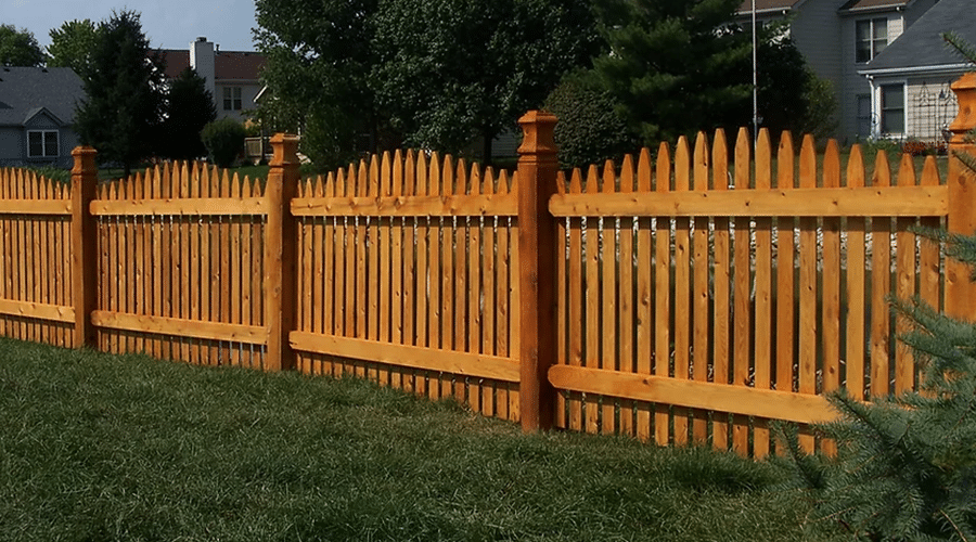 Cedar picket fence installation