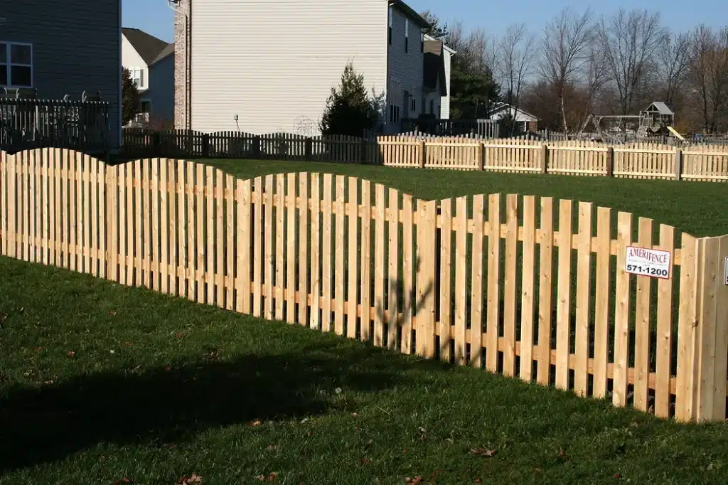 Bow top picket fence installation around Indianapolis