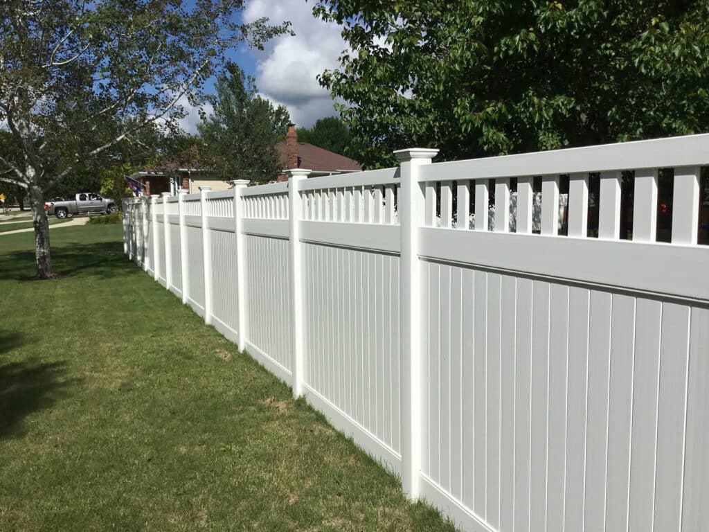 lattice-topped white vinyl fence installation in Indianapolis