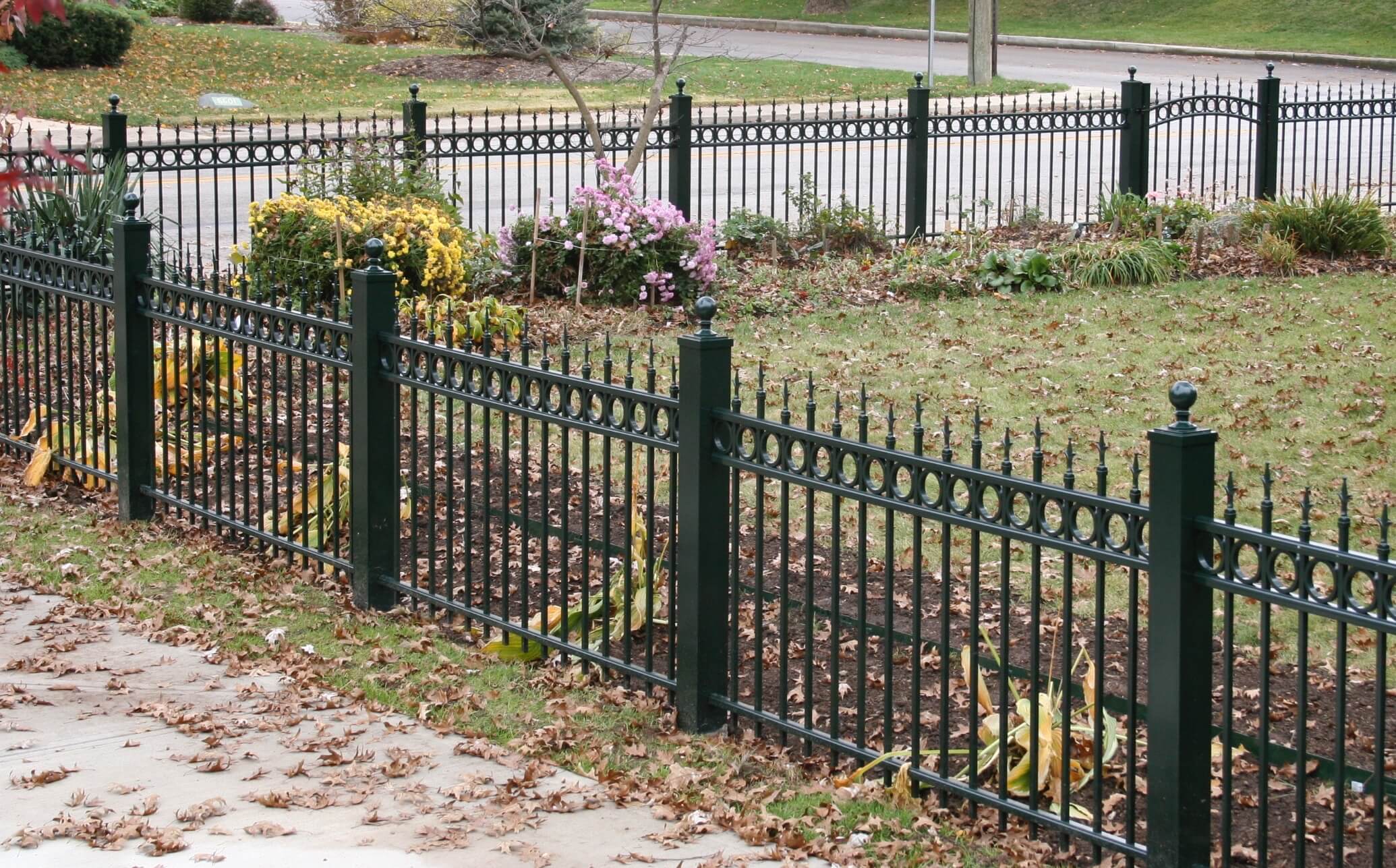 Custom metal fence installation around Indianapolis